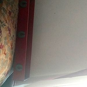 Wood shelf. Brown 24" long. 6" wide. 2" deep. Great for plants. 3 horseshoes